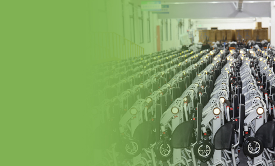 Rows of wheelchairs in the OasisMove warehouse